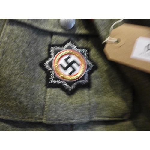 350 - A GOOD QUALITY REPLICA NAZI GERMANY SS UNIFORM SIZE LARGE COMPRISING JACKET WITH ASSORTED BRAVERY AW... 