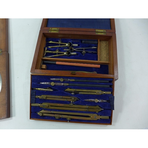 390 - A CASED SET OF DRAWING INSTRUMENTS AND A CASED TROUGHTON AND SIMMS OF LONDON DEGREE RING AND MAGNIFY... 