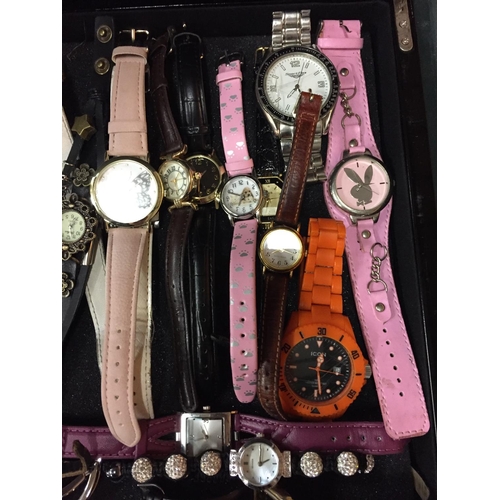 192 - A LARGE QUANTITY OF WRISTWATCHES IN A WOODEN BOX