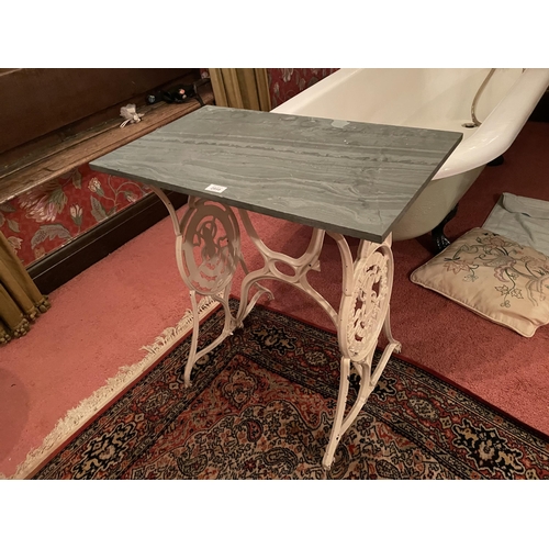 2958 - A CAST IRON TABLE WITH MARBLE TOP