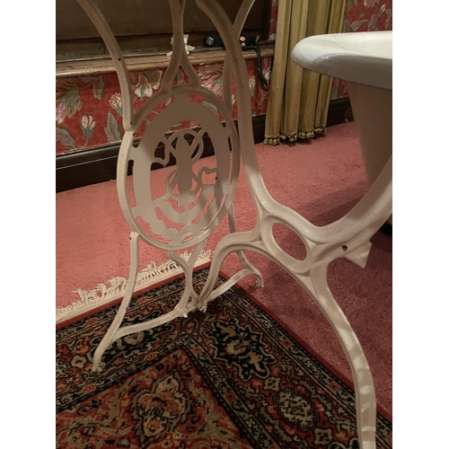 2958 - A CAST IRON TABLE WITH MARBLE TOP