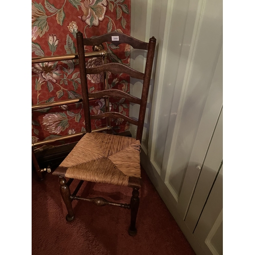 2959 - A LANCASHIRE STYLE OAK LADDER BACK DINING CHAIR WITH RUSH SEAT