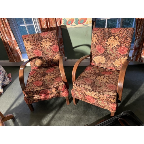 2963 - TWO OAK FRAMED ARMCHAIRS WITH FLORAL UPHOLSTERY