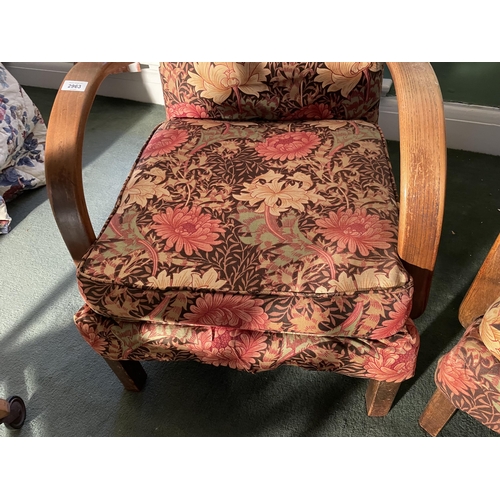 2963 - TWO OAK FRAMED ARMCHAIRS WITH FLORAL UPHOLSTERY