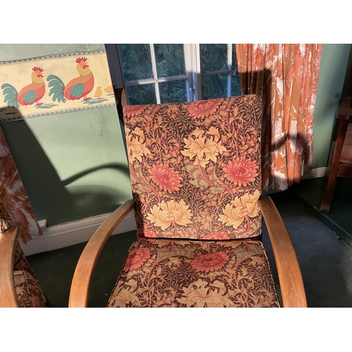 2963 - TWO OAK FRAMED ARMCHAIRS WITH FLORAL UPHOLSTERY