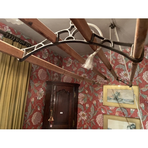 2973 - A CEILING SUSPENDED CAST IRON AND PINE CLOTHES AIRER