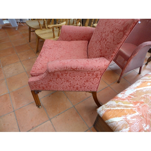 2981 - A CHIPPENDALE STYLE MAHOGANY FRAMED ARMCHAIR UPHOLSTERED IN RED MATERIAL AND A LLOYD LOOM TYPE CHAIR... 