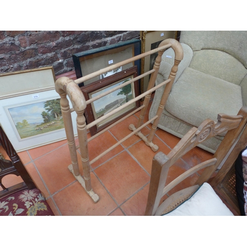 2982 - A PAIR OF CARVED BEECHWOOD CHAIRS WITH CANE SEATS, TOWEL RAIL AND TWO LABRADOR CUSHIONS