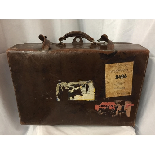 6 - A THE MARTIN WITH EVERLASTING SPRINGS LEATHER SUITCASE STAMPED H W FIDDAMAN WITH LABELS TO INCLUDE P... 