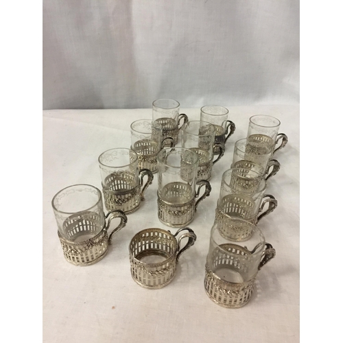 10 - A SET OF TWELVE MARKED 925 SILVER STIRRUP CUP HOLDERS WITH GLASSES (ONE NO GLASS)