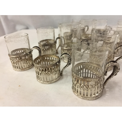 10 - A SET OF TWELVE MARKED 925 SILVER STIRRUP CUP HOLDERS WITH GLASSES (ONE NO GLASS)