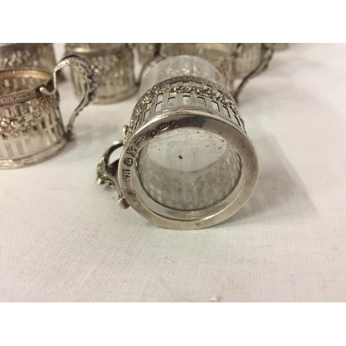 10 - A SET OF TWELVE MARKED 925 SILVER STIRRUP CUP HOLDERS WITH GLASSES (ONE NO GLASS)