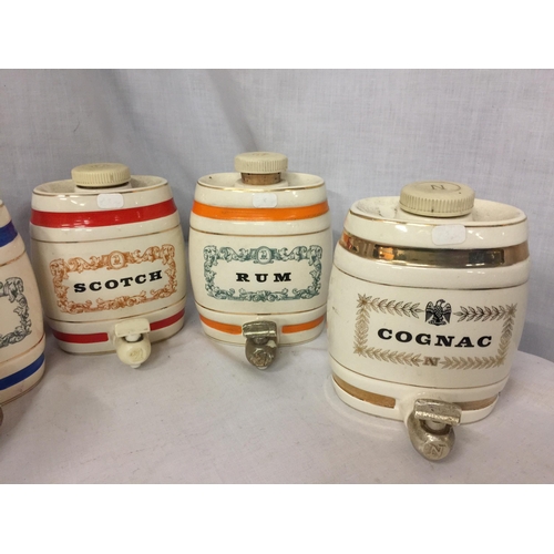 13 - FIVE WADE CERAMIC BARRELS TO INCLUDE GIN, RUM, SCOTCH AND COGNAC 12CM HIGH