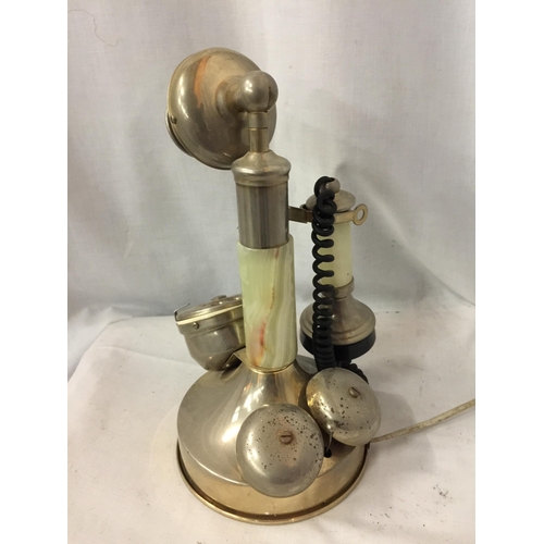 23 - A VINTAGE STYLE WHITE METAL AND ONYX CANDLESTICK TELEPHONE CONVERTED TO MODERN SOCKET