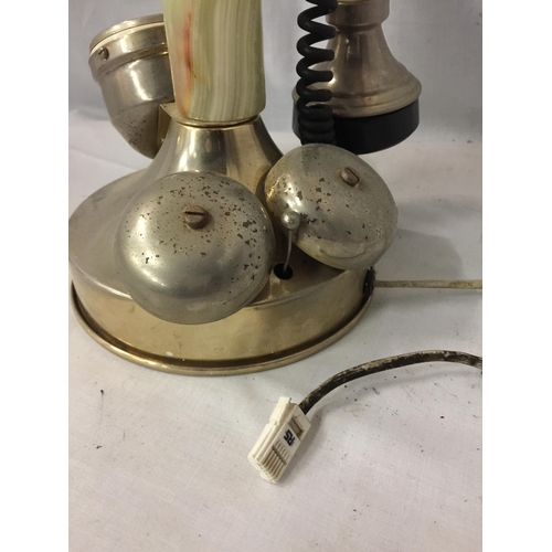 23 - A VINTAGE STYLE WHITE METAL AND ONYX CANDLESTICK TELEPHONE CONVERTED TO MODERN SOCKET