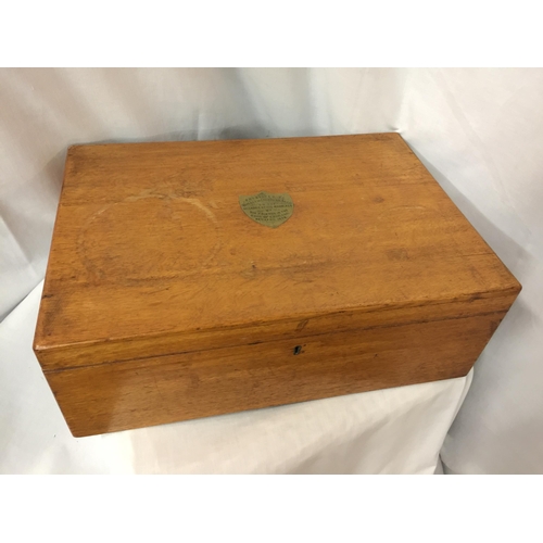 25 - A LARGE THREE LEVEL OAK CANTEEN OF CUTLERY  BOX WITH BRASS HANDLES AND TWO KEYS, BRASS PRESENTATION ... 