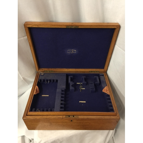 25 - A LARGE THREE LEVEL OAK CANTEEN OF CUTLERY  BOX WITH BRASS HANDLES AND TWO KEYS, BRASS PRESENTATION ... 