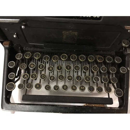 27 - A VINTAGE 'IMPERIAL MODEL 60' TYPEWRITER