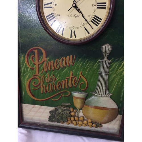 32 - A PINEAU DES CHARENTES ADVERTISING BOARD WITH CLOCK