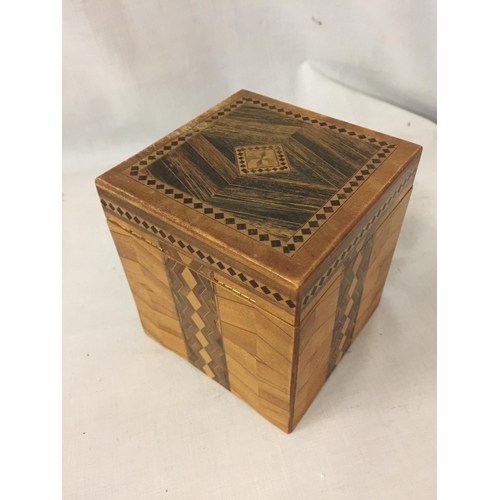 37 - A MARQUETRY INLAID CIGARETTE BOX WITH A TOUCAN STYLE WOODEN BIRD