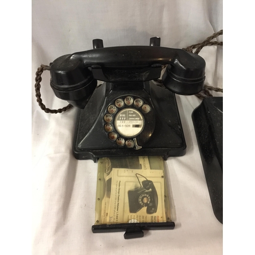 39 - A VINTAGE ROTARY DIAL BLACK BAKELITE G.P.O. TELEPHONE 1/232CB FWR55/2 TOGETHER WITH WALL MOUNTED BOX... 