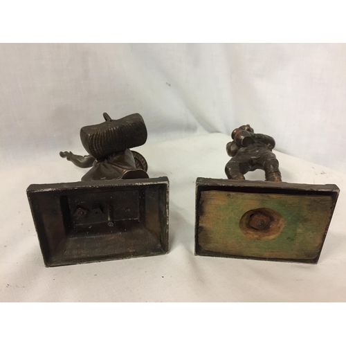 56 - A PAIR OF BRONZE DIPPED FRENCH GRAPE PICKER METAL FIGURINES