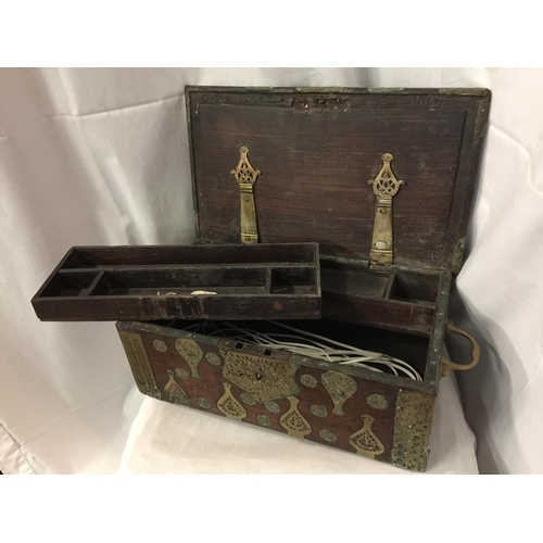 7 - A DUTCH EAST INDIES PADOUK WOOD TRAVELLING BOX WITH BRASS DECORATION AND HANDLES