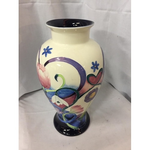 71 - A LARGE TUPTON FLORAL BALUSTER FORM VASE