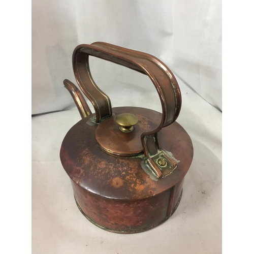 72 - A HEAVY COPPER KETTLE