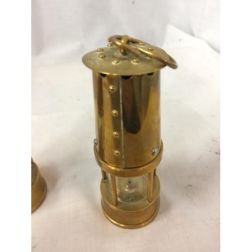 75 - TWO MINI BRASS MINERS LAMPS