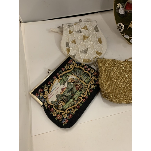 170 - FOUR VINTAGE EVENING BAGS TO INCLUDE BEADED ONES AND A TAPESTRY ONE, ALSO A SHIELD SHAPED DISPLAY BO... 