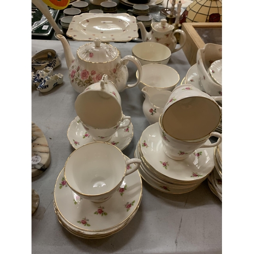 181 - A LARGE QUANTITY OF CHINA DINNERWARE TO INCLUDE CUPS, SAUCERS, PLATES, TEAPOTS, BOWLS, ETC