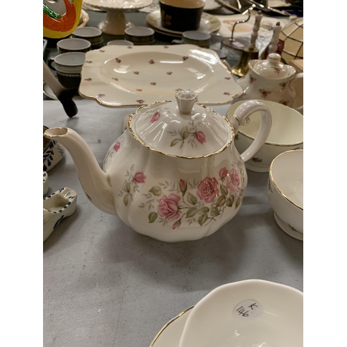 181 - A LARGE QUANTITY OF CHINA DINNERWARE TO INCLUDE CUPS, SAUCERS, PLATES, TEAPOTS, BOWLS, ETC