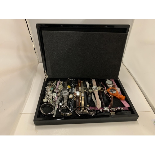 192 - A LARGE QUANTITY OF WRISTWATCHES IN A WOODEN BOX