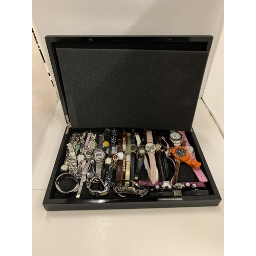 192 - A LARGE QUANTITY OF WRISTWATCHES IN A WOODEN BOX