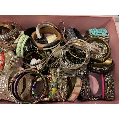 208 - A LARGE BOX OF BANGLES AND BRACELETS