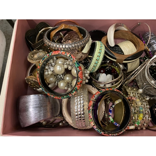 208 - A LARGE BOX OF BANGLES AND BRACELETS