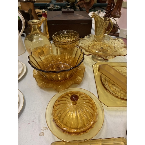 211 - A LARGE AMOUNT OF AMBER COLOURED GLASS TO INCLUDE JUGS, PLATES, BOWLS, ETC