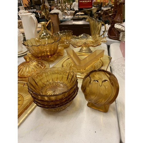 211 - A LARGE AMOUNT OF AMBER COLOURED GLASS TO INCLUDE JUGS, PLATES, BOWLS, ETC