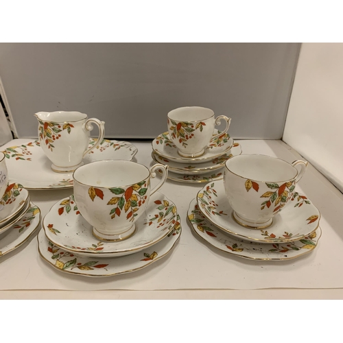 226 - BELL CHINA CUPS, SAUCERS, PLATES, ETC IN A DELICATE ORANGE, YELLOW AND GREEN FLORAL PATTERN