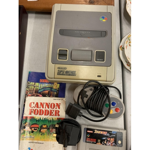 227 - A VINTAGE SUPER NINTENDO ENTERTAINMENT SYSTEM WITH FIVE GAMES; FIFA 96, STRIKER, DONKEY KONG, LEMMIN... 