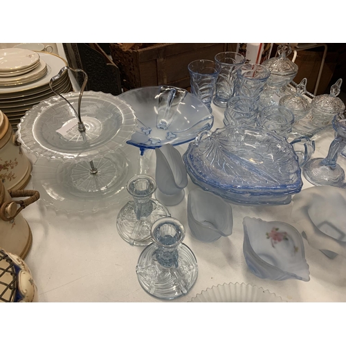 138 - A LARGE QUANTITY OF BLUE COLOURED GLASSWARE TO INCLUDE LEAF SHAPED SERVING DISHES, BOWLS, GLASSES, C... 