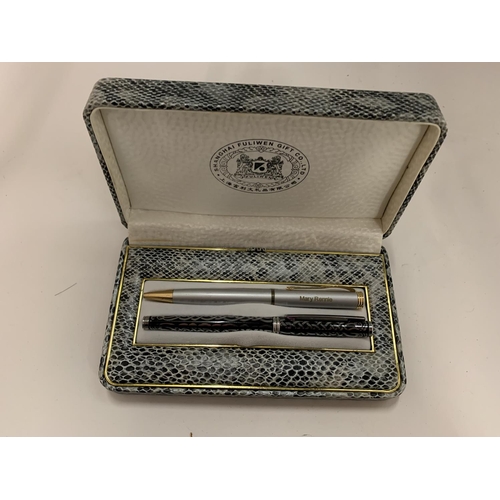 115 - A BOXED SET OF TWO PENS