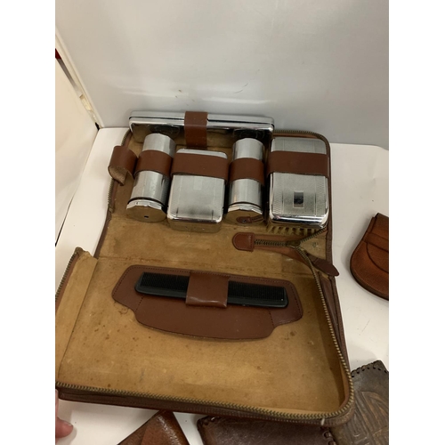 120 - A GENTS LEATHER CASED TOILET SET ETC