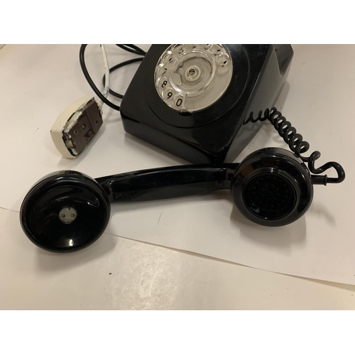 135 - A BLACK VINTAGE DIAL TELEPHONE