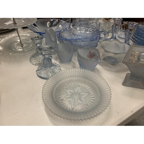 138 - A LARGE QUANTITY OF BLUE COLOURED GLASSWARE TO INCLUDE LEAF SHAPED SERVING DISHES, BOWLS, GLASSES, C... 