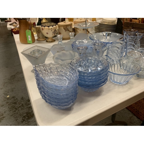 138 - A LARGE QUANTITY OF BLUE COLOURED GLASSWARE TO INCLUDE LEAF SHAPED SERVING DISHES, BOWLS, GLASSES, C... 