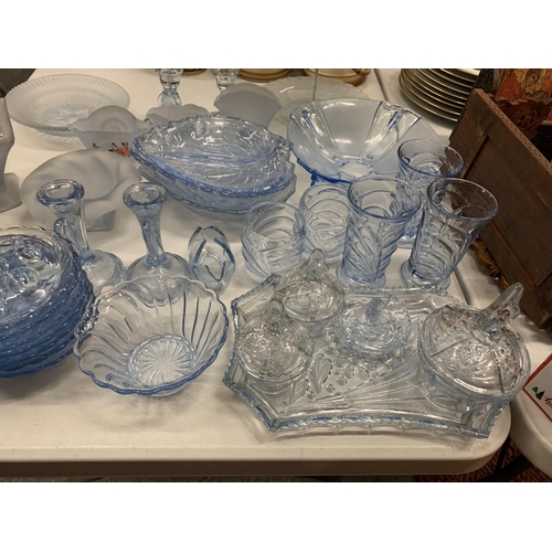 138 - A LARGE QUANTITY OF BLUE COLOURED GLASSWARE TO INCLUDE LEAF SHAPED SERVING DISHES, BOWLS, GLASSES, C... 