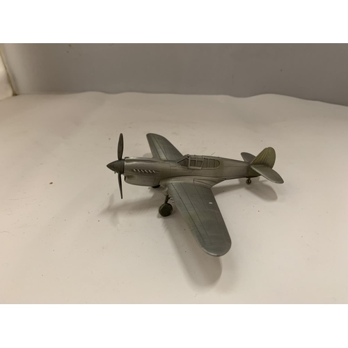 84 - A PEWTER REPLICA OF A CURTISS P-40 WARHAWK AMERICAN FIGHTER AIRCRAFT