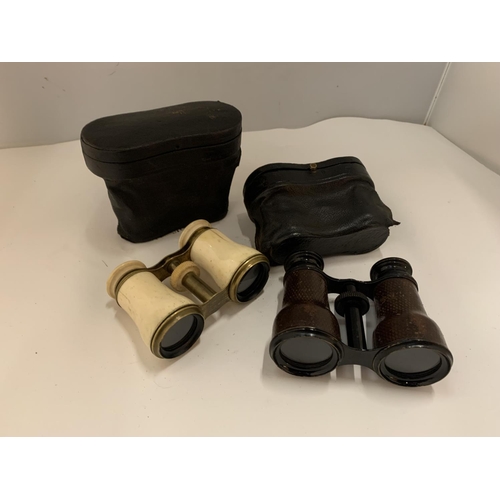 87 - TWO PAIRS OF OPERA GLASSES IN LEATHER CASES